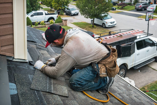 Professional Roofing technician working in North Providence, RI